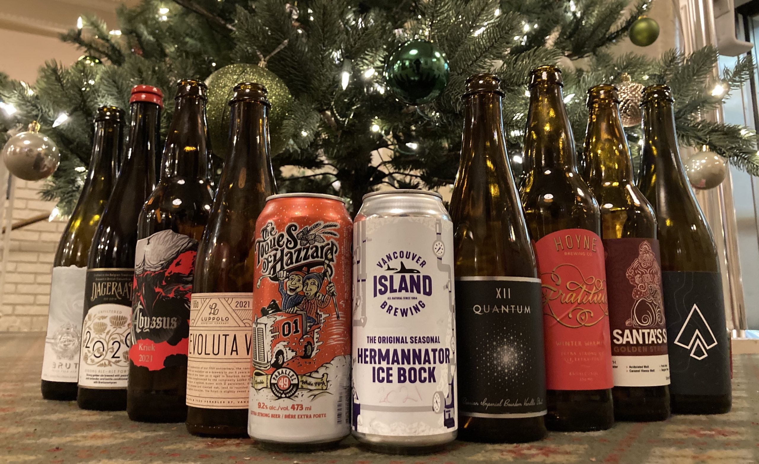 craft beers in front of a christmas tree